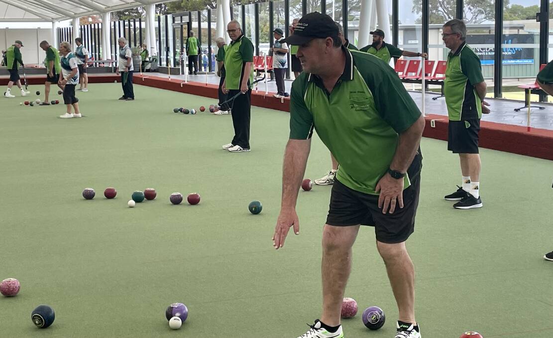 Lawn bowler Bryan Sheehan directs his team in the thrilling weekend pennant match under the dome at City Memorial Bowls Club.