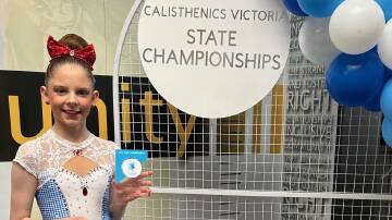 Warrnambool's Anna Robson is all smiles after winning her state title in Melbourne. Picture supplied