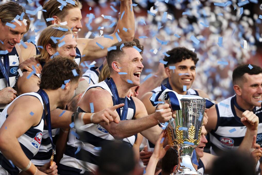 Geelong celebrates after winning its first flag in 11 years. Picture by Getty Images