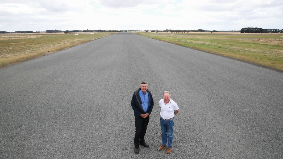 UPGRADE: Terry O'Sullivan and Max Taylor at the Warrnambool Airport, which now has an upgraded cross runway. Picture: Morgan Hancock