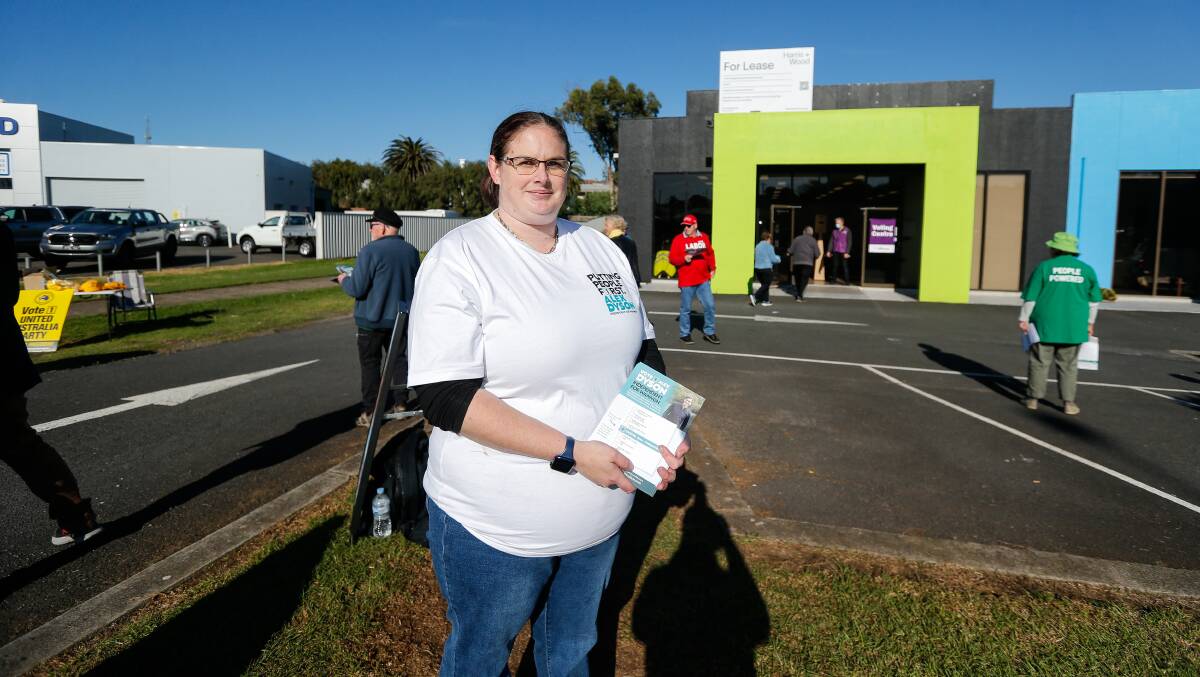 Campaign volunteer Emma Holcombe said the shared space between voters, volunteers and cars was not the safest situation. Picture: Anthony Brady