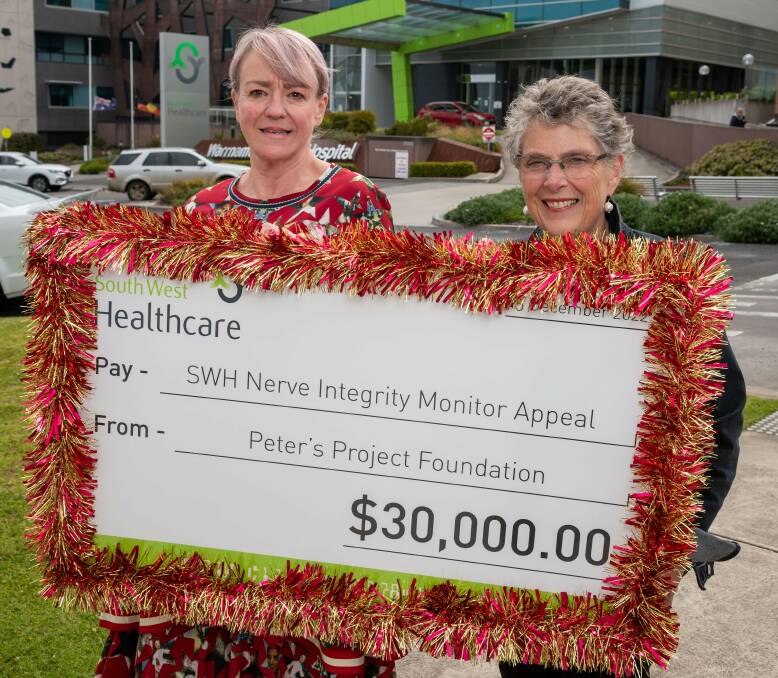 South West Healthcare Christmas Appeal manager Suzan Morey, left, receives a $30,000 donation from Peter's Project Foundation director Vicki Jellie. Picture supplied