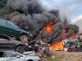 Over 15 fire trucks attended the blaze at a car scarp yard in Trenayr, north of Grafton, in New South Wales. Picture supplied.
