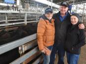 Dorothy and Andrew Graham and Nikki Edgar, Hepworth, Yambuk, sold a pen of 37 steers, 407kg, for 630c/kg or $2567, and another pen of 22 steers, 358kg, for 674c/kg or $2417. Pictures by Philippe Perez.