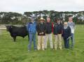 Hamish Branson, Banquet, Peter Godbolt, Nutrien, Ross Milne, Elders, and purchasers of the top-priced bull David, Vivienne and Damon Young, Londavra Angus stud, St Marys, Tas, with Lot 4, Banquet Top Deck T020, which sold for $42,000. Picture by Philippe Perez