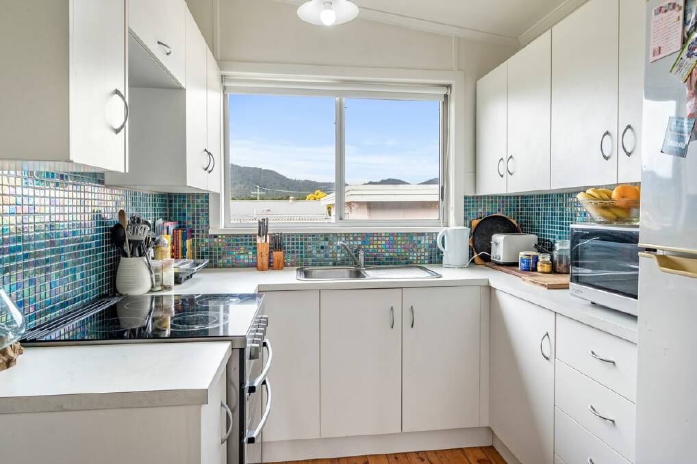 The kitchen windows captures expansive views across the hills. Picture supplied