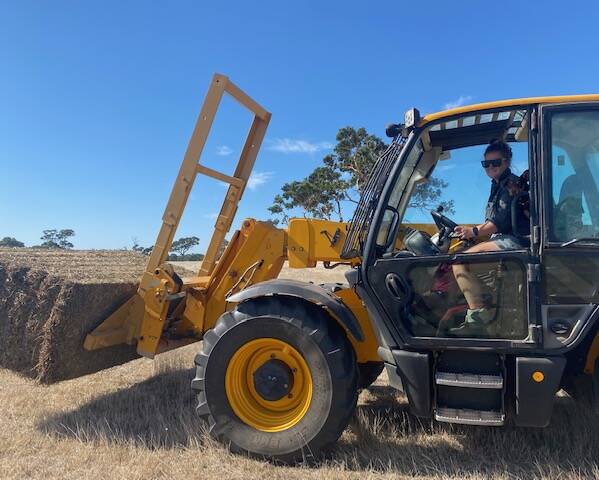 Green & Gold Contractors will always give you an honest and upfront appraisal of the hay on the truck. Pictured here is Penny and Hipi feeding stock on their farm. Picture supplied. 