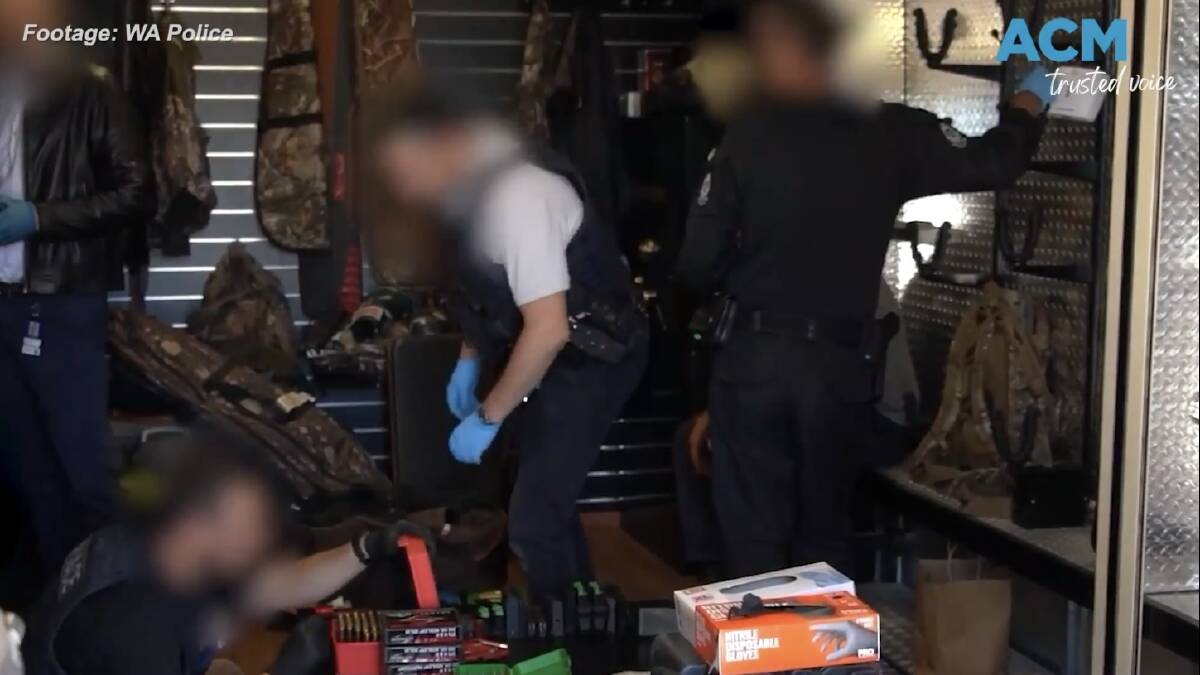 Police search the arsenal of weapons. Picture by WA police