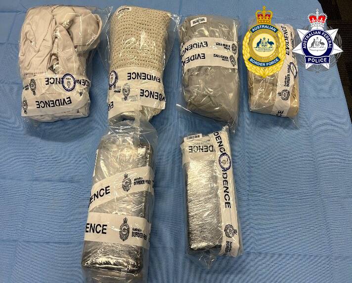 Packages allegedly containing cocaine found in the suspects' luggage wrapped in clothes. Picture supplied