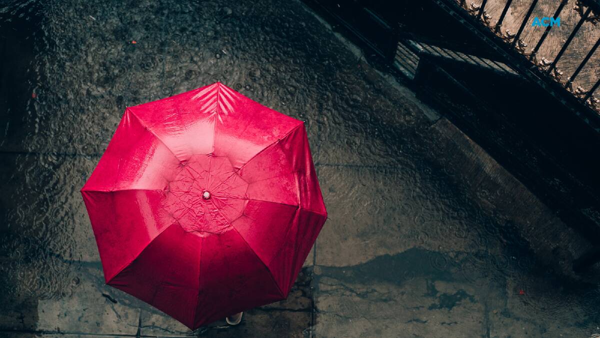 A red umbrella shot from above in the rain. File picture.