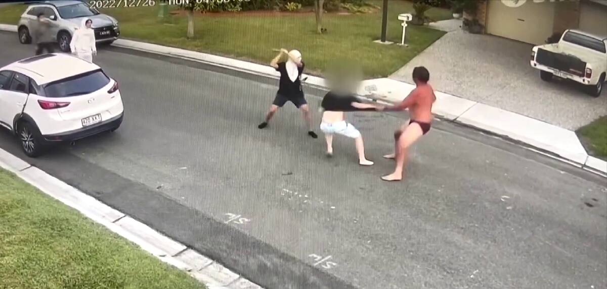 A still image from video footage shows Mr Middleton maneuvering to avoid the teen weilding a baseball bat. Picture by 7News.