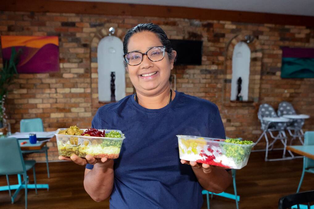Sri Agri Kitchen owner Chamari Ariyadasa with some of her restaurant's new meal packs. Pictures by Anthony Brady