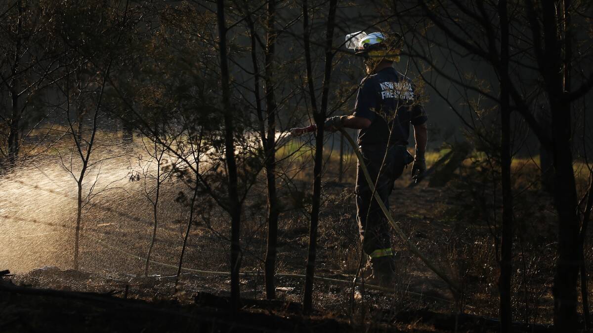 NSW Rural Fire Service respond to a fire in the state's Hunter region on September 18. Picture by Simone De Peak/Newcastle Herald