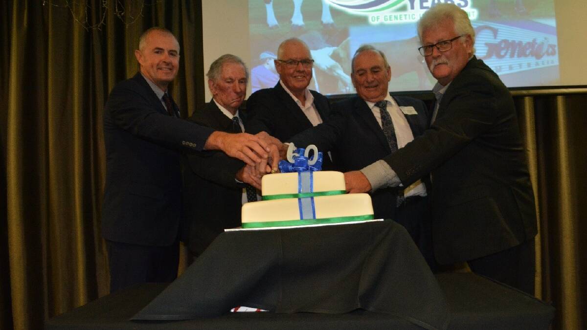 Former Genetics Australia chairman John Harlock, centre, of Warrnambool, cuts a cake to mark the cooperative's 60th anniversary with current chairman Trevor Henry, left, and other former chairmen Peter Stewart, Colin Gardner and Ross Gordon.
