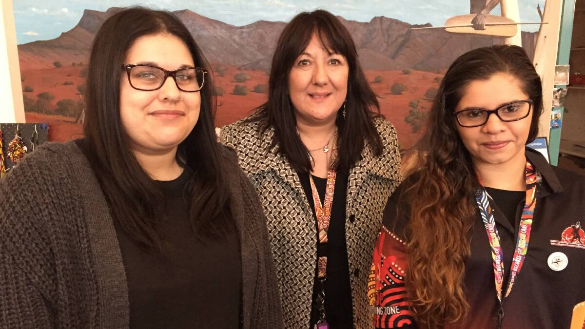 Brianna Harrison, Roslyn Clarke-Britton and Doreen Austin applauded this year's NAIDOC Week theme "Because of Her, We Can."  
