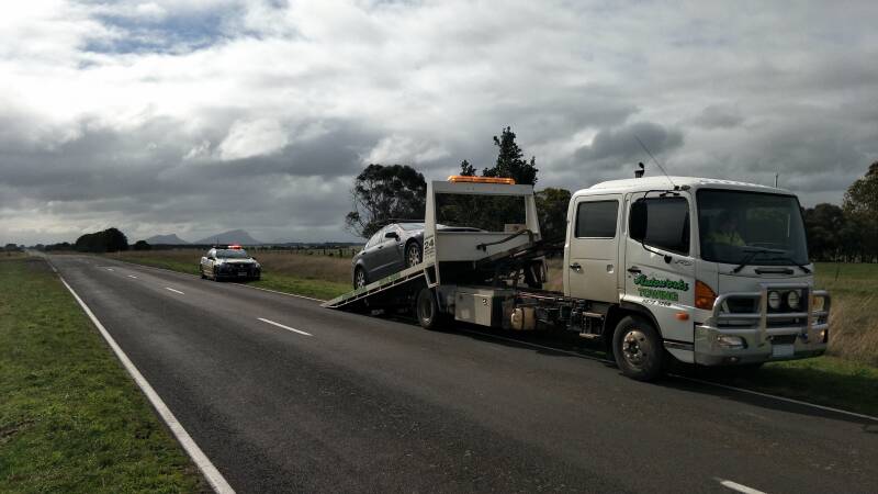 The car that was allegedly driven at 167 kmh near Penshurst is loaded on to a tow truck after being impounded for a month.