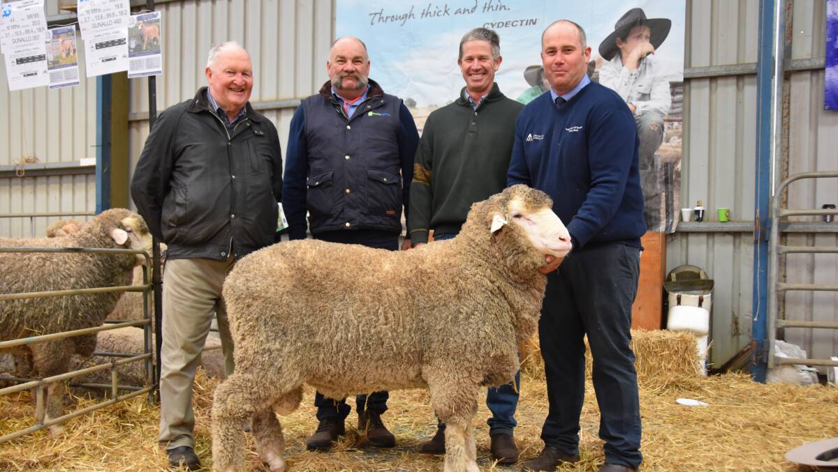 SECOND TOP: The $16,000 ram that fetched the second highest price with classer Bill Milldren, buyers Coryule's Craig Trickey and Mitre Rock's Darren Cameron, and vendor Poll Boonoke's Angus Munro.
