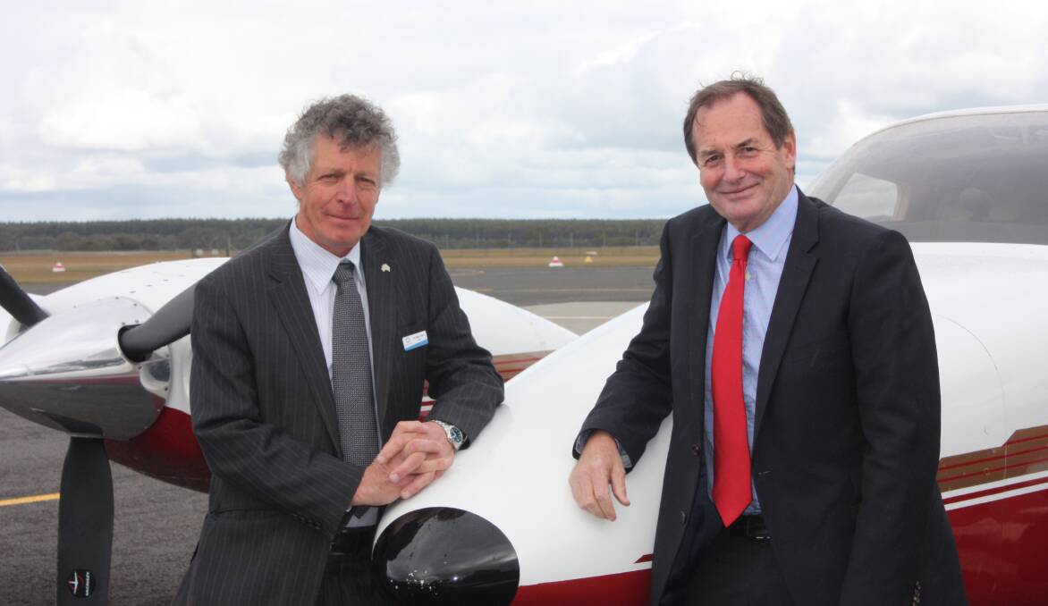 Taking off: Southern Grampians mayor Peter Dark (left) and Member for Western Victoria Simon Ramsay at the opening of the upgraded Hamilton airport. 