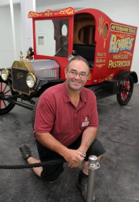 Firing up: Warrnambool Motor Museum site manager Troy Kelly with a museum exhibit, a 1915 Model T delivery truck. Picture: Rob Gunstone