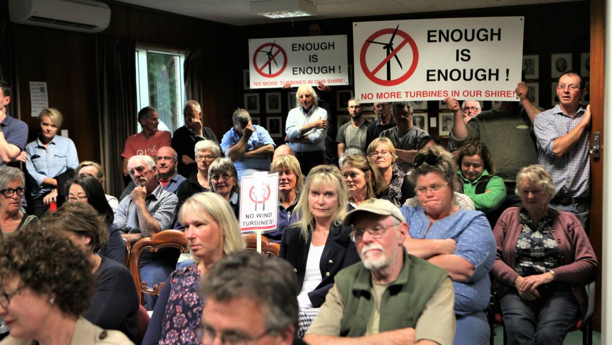No more: Opponents of more wind farms in Moyne Shire made a rowdy statement from the public gallery at Moyne Shire Council's meeting at Mortlake. 