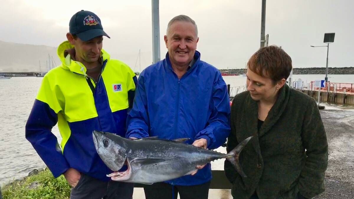 Against reducing the tuna recreational take: State agriculture minister Jaala Pulford with fishing charter operator Matthew Ash, left, and recreational fishers leader Rob Loats from VR Fish. 