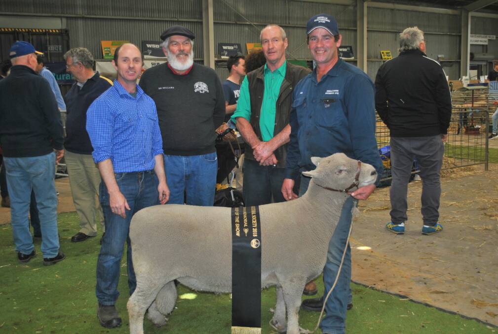 All breeds champion: George Melano, judges Doug Deppeler and Alistair Sutherland and Ned Nagorcka, 