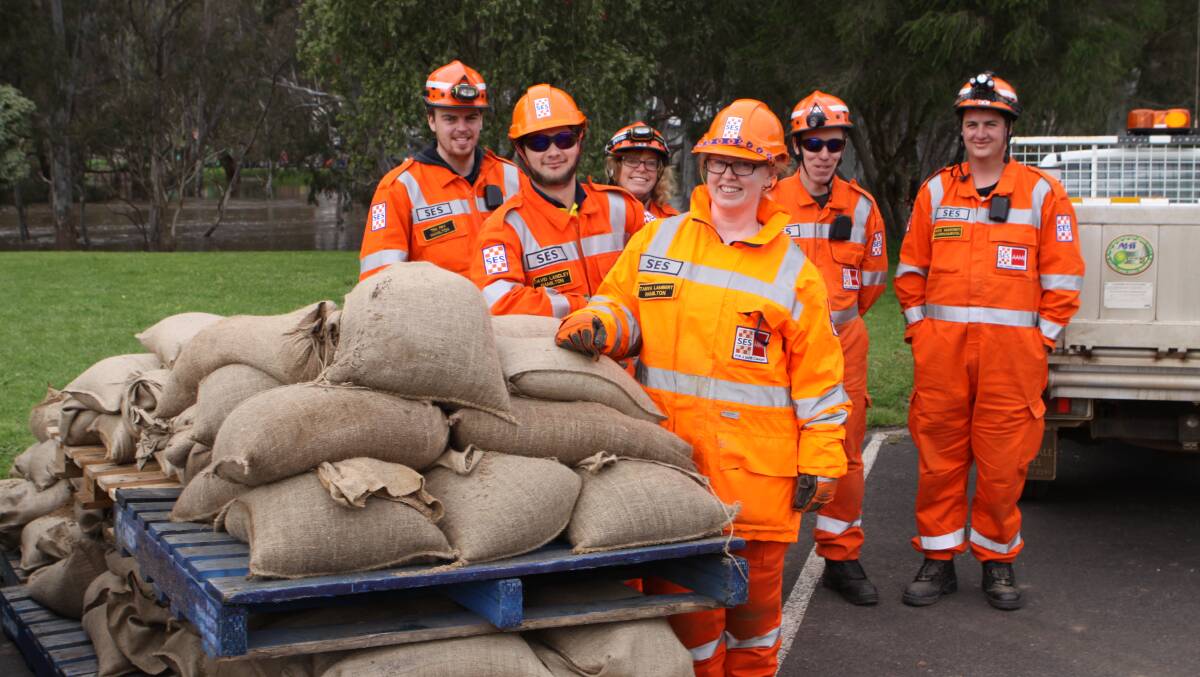 SES volunteers at a sandbag collection point at Casterton earlier this month.