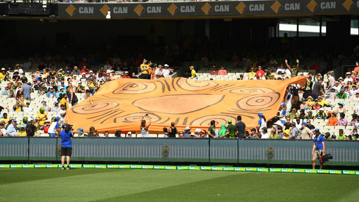 IMPRESSIVE: Fiona's Walkabout Wickets banner at the 2016 Boxing Day Test in Melbourne. (below)