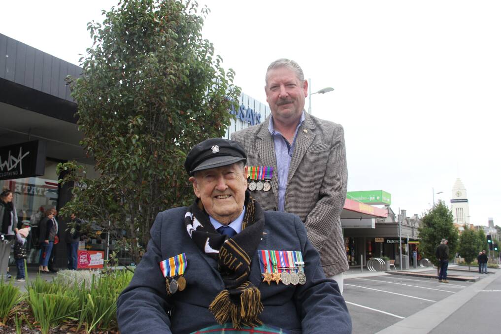 LEGENDS: Warrnambool's Victor Henshaw, a World War II veteran and son-in-law Leading Senior Constable Glenn McDuff. Leading Senior Constable McDuff wears his father's medals from the British Army. Picture: Rachael Houlihan