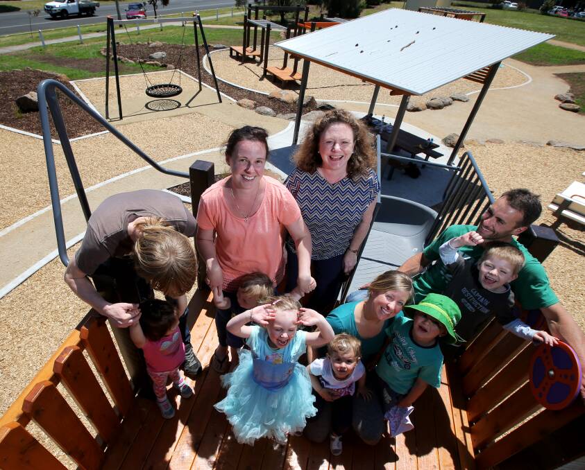 FUN IN THE SUN: Warrnambool City Council mayor Kylie Gaston with happy patrons at the newly developed playground on Cramer Street in Warrnambool. Picture: Rob Gunstone