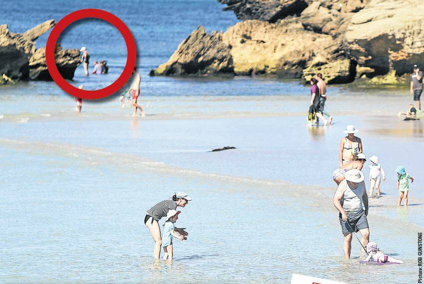 Swimmers flout danger at tragic bay | photos