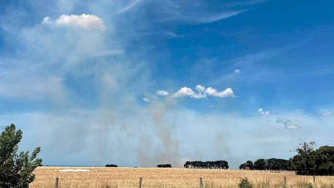FIRE: Smoke could be seen coming from the blaze which started on the roadside at Mailors Flat.
