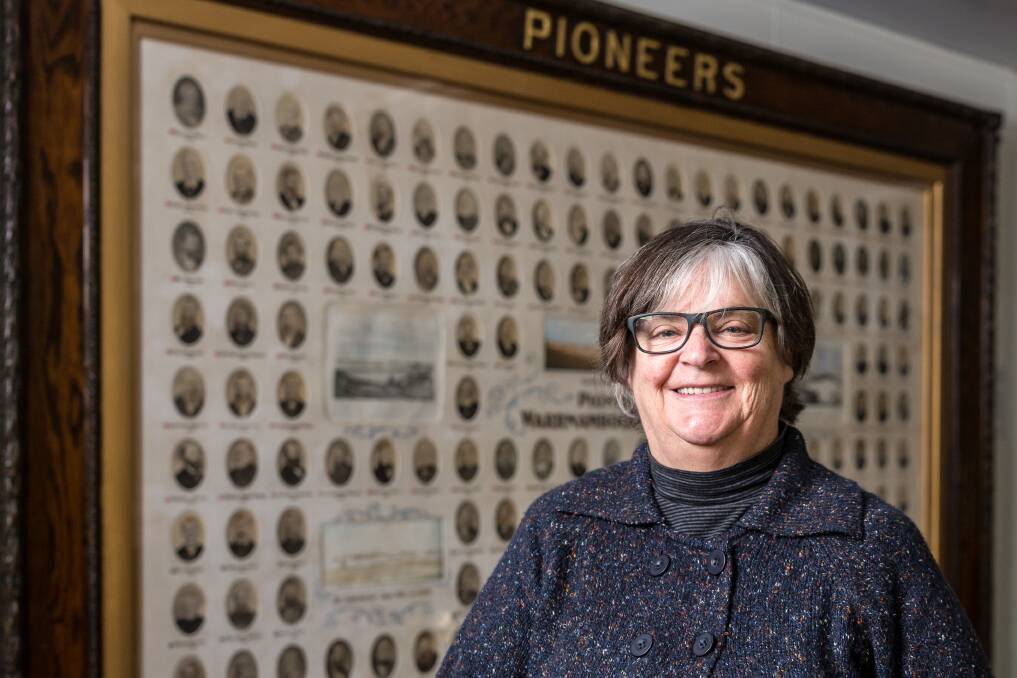 LEGEND: Warrnambool City Council's Australia Day citizen of the year Janet Macdonald stands in front of Warrnambool and District Historical Society's restored pioneer board. Picture: Christine Ansorge