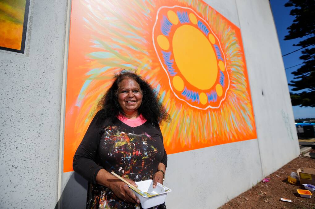 STUNNING ARTWORK: Artist Fiona Clarke with her new painting at Western Region Alcohol and other Drug Centre. Picture: Anthony Brady