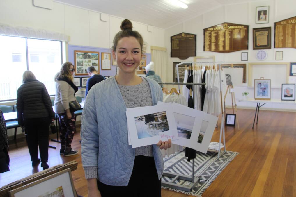 GORGEOUS: Photographer Molly Rose Smith holds some of her film prints which were for sale on Saturday at Port Fairy's RSL Hall. 
