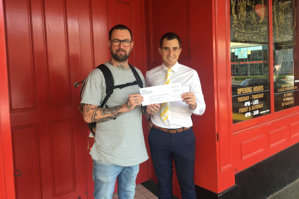 GREAT JOB: Seanchai Irish Bar owner Josh O'Dowd with Young Professionals Warrnambool representative Steve Aberline. The group is donating $1280.