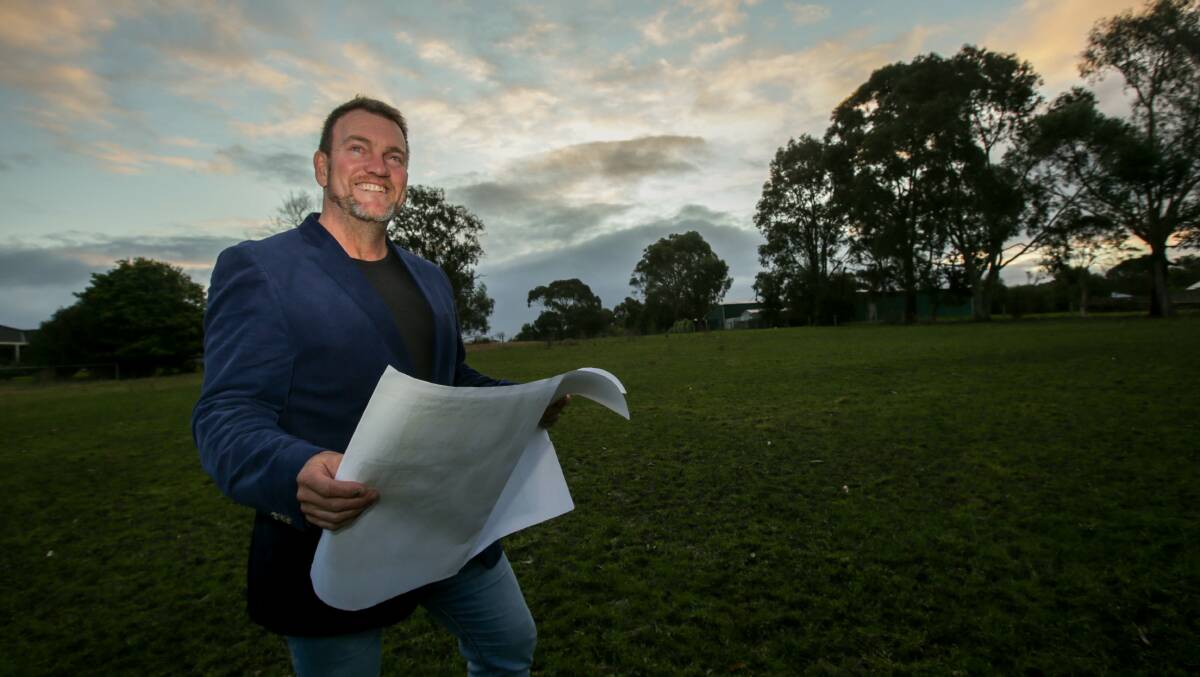 High demand: Peter Worden, director of Nutrien Harcourts Timboon, with plans for a housing development in Timboon. Picture: Chris Doheny 
