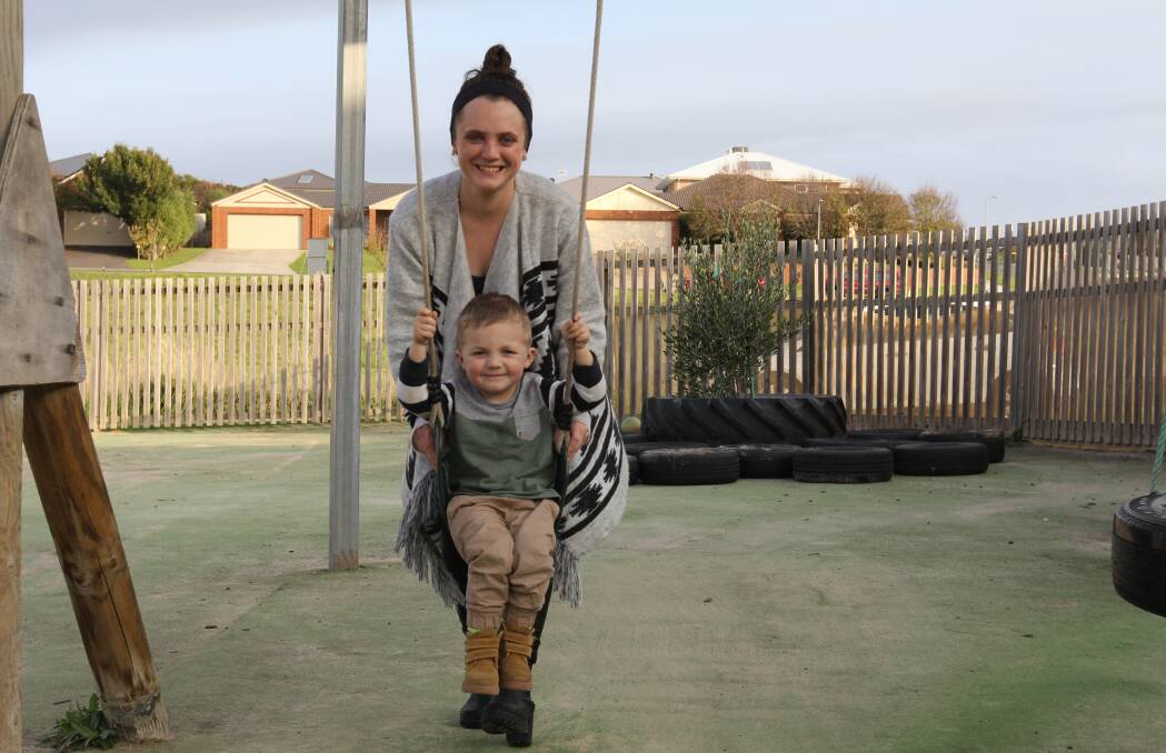 LOVE: Warrnambool's Sonny Beasley, 3, with his mum Madelynn Crimmin on the swings at the Goodstart Early Learning Centre's Mother's Day afternoon tea.