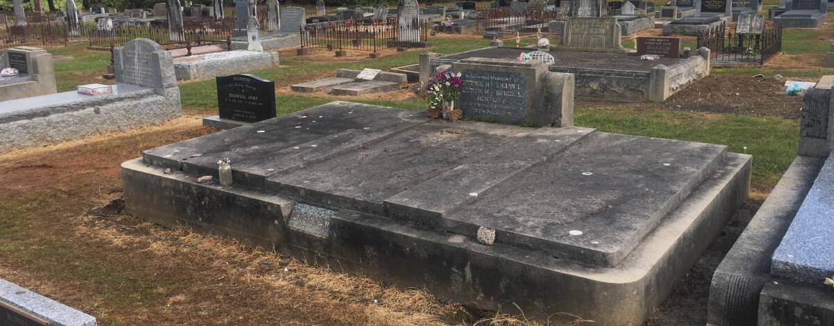 REMEMBERING: The Sparrow family grave at the Macarthur cemetery. Father George, mother Lillian and children Letita, Bruce and Ronald died in the 1946 floods that devastated the south-west. 