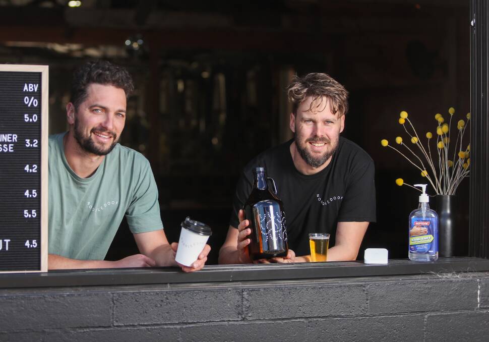 PUSH ON: Koroit and District Progress Association's Sam Rudolph, pictured with his Noodledoof brewery business partner Alex Carr at their Koroit brewery. 