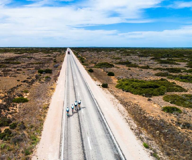 RIDING ALONG THE OPEN ROAD: Let's Talk cyclists ride across the Nullarbor on their journey to Warrnambool. Picture: Ben Stamatovich/The Drone Way 