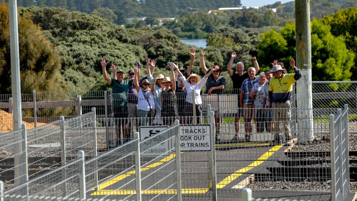 IT'S FINALLY DONE: South Warrnambool residents gather at Gilles Street crossing to celebrate the opening of the crossing they campaigned for. Picture: Chris Doheny