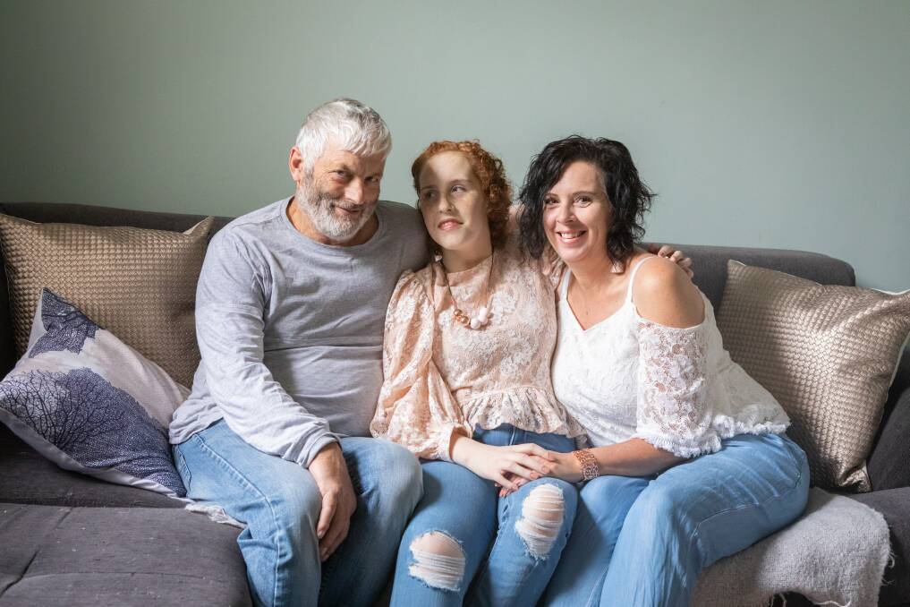 Crystal with her parents Trevor and Jo. Picture: Maja Pearson for Heartfelt 