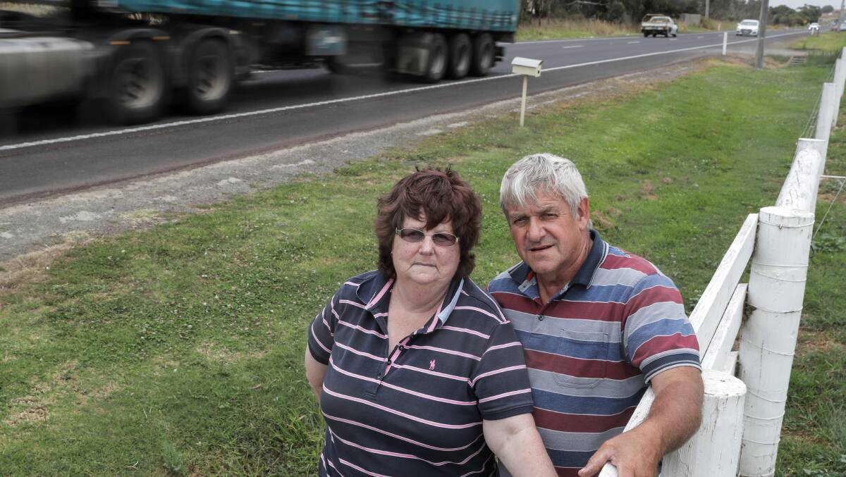FIX IT: Illowa residents David and Shirley Watts want to see an upgrade to the Princes Highway after having to negotiate the traffic along this stretch of road for the past 12 years. Picture: Rob Gunstone      