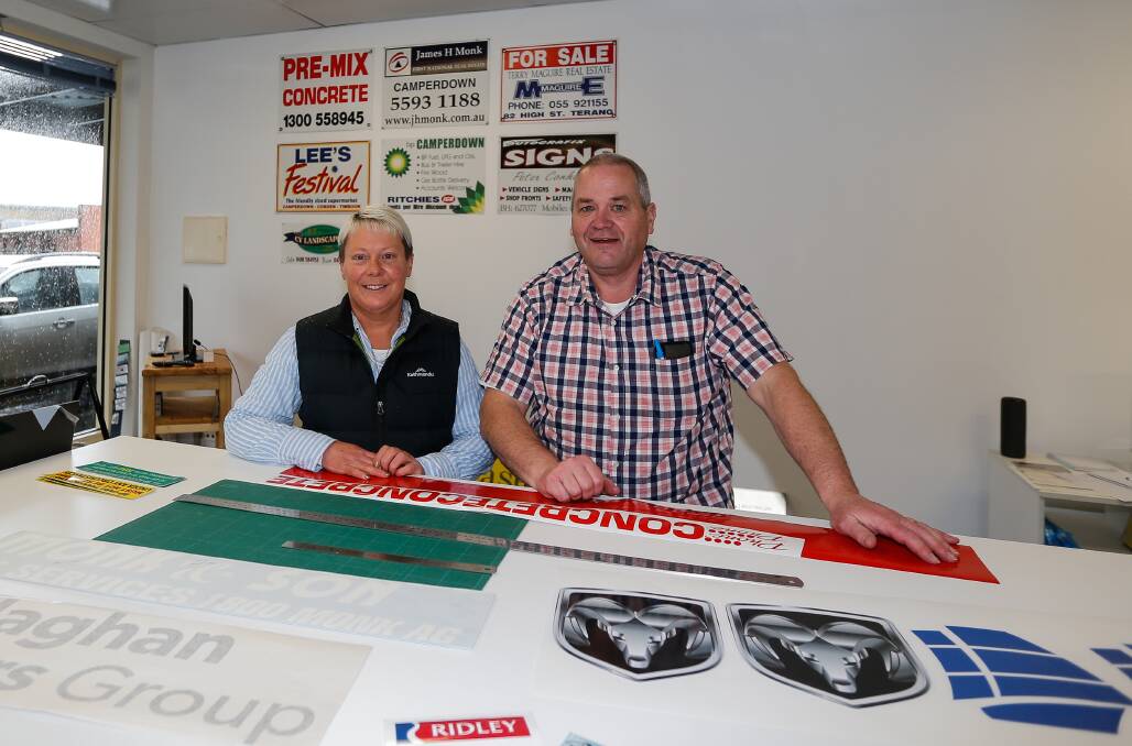FRESH: Donna and Peter Conheady at their new shop in Camperdown, Mr Sign. Mr Conheady will have to travel a much shorter distance to get to his new workplace. Picture: Anthony Brady