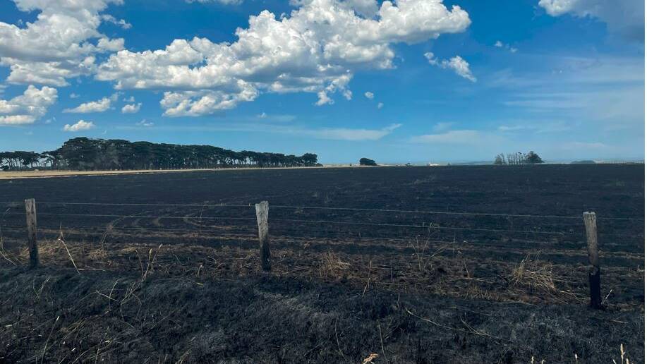 BURNT: About 100 acres of grassland is now black after the fire.
