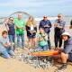 Colleen Hughson, Delia Crabbe, Bruce Campbell, Jenna Umney, Tonia Wilcox, Mark Rashleigh, Julie Eagles, Luke Foster and Baz Law with rubbish from Warrnambool Beach. Picture by Anthony Brady 