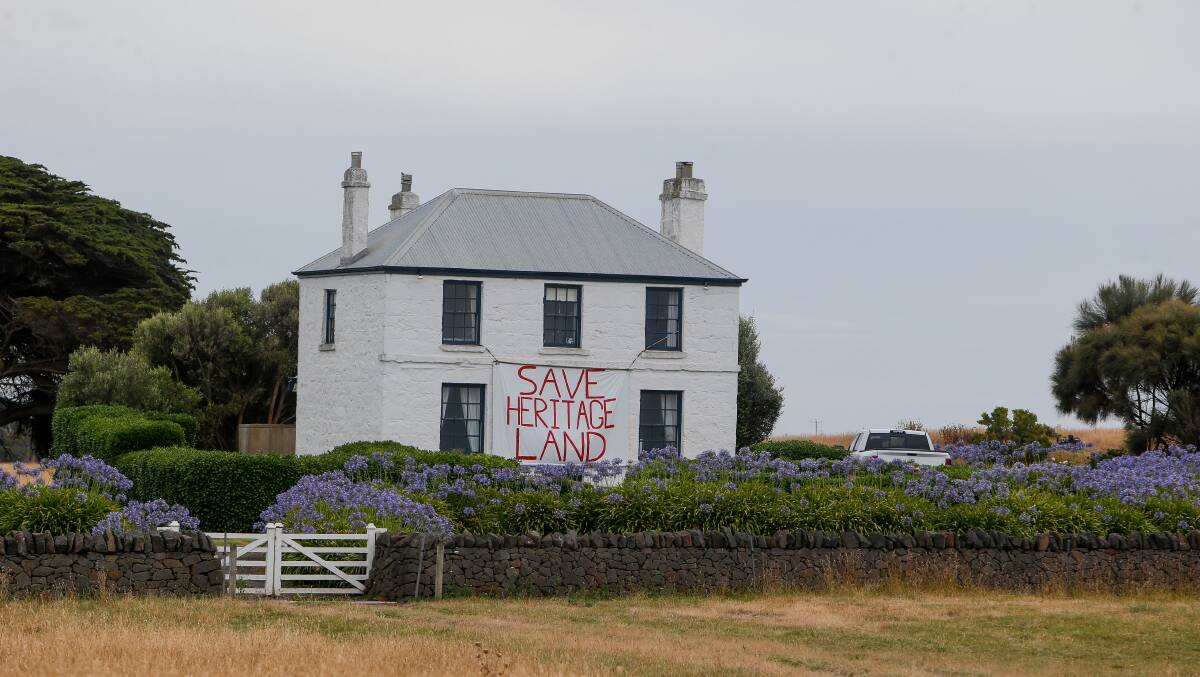 Divisive: Paul Bridgeford's posted a sign expressing his opposition to the sale of the land. Picture: Anthony Brady.