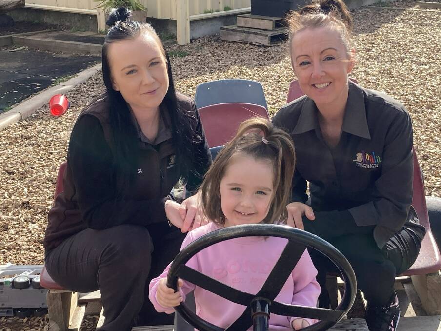 ALL SMILES: Melissa Hansford with her mum Carol Hansford and daughter Rubie Ross, 4, at Koala Childcare and Early Learning Centre.