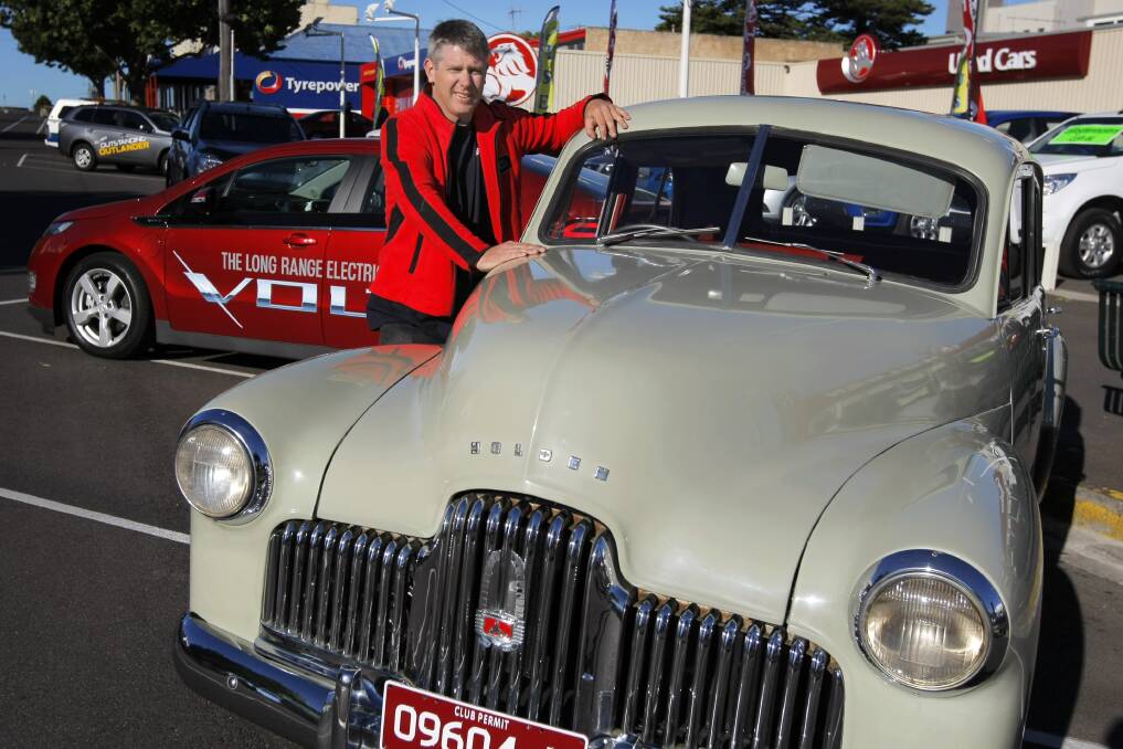 BITTERSWEET: Western Victoria Car Club president Peter Dunn with a vintage Holden. He fell in love with the brand when he bought his first car at age 18.